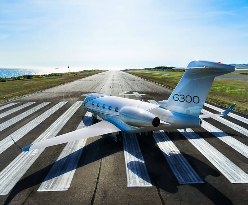 A Gulfstream G300 parked on runway