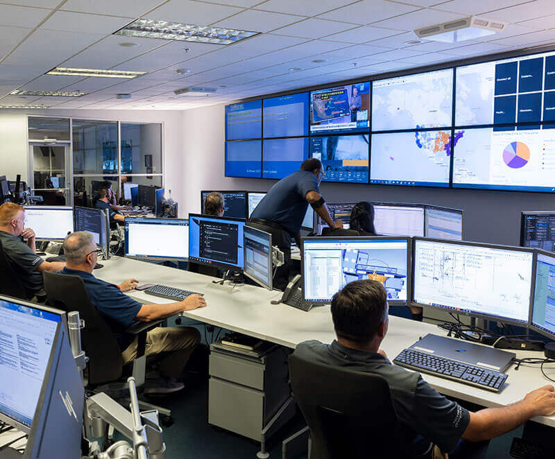 Gulfstream Field and Airborne Support team members disembark from a FAST aircraft.